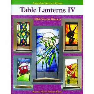 Puede incluir: Un libro titulado "Table Lanterns IV" con "2004 Contest Winners" mostrado. La portada presenta imágenes de faroles de mesa de vidrieras en varios diseños, incluyendo patrones geométricos, bambú y motivos florales. El libro es un libro de patrones de vidrieras.