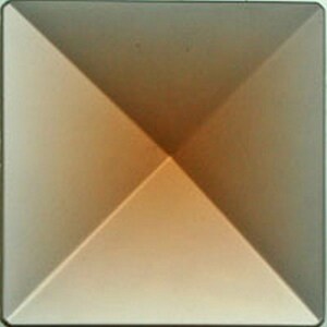 May include: A square, pyramid-shaped, light brown, metal finial.