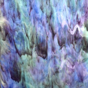 May include: Abstract stained glass with a flowing pattern of blues, purples, and greens. The colors blend and swirl, creating a textured, watercolor-like effect. The glass has a translucent quality.