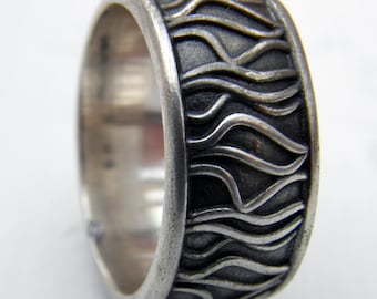 KFRWATER Water's Edge Ring in silver designed by Kim Fo
