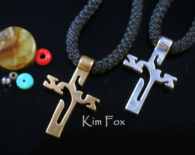 KFP171 Jesus Cross in Bronze and Silver The design is based on one from Central America is has a surprise when you look at it.