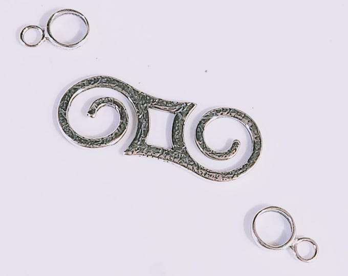 KF286 Double Spiral Removable Clasp with Celtic Pattern in bronze by Kim Fox