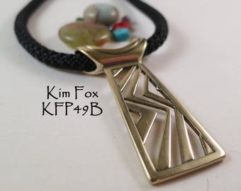 Higher Ground Tablet Pendant in Golden Bronze designed by Kim Fox