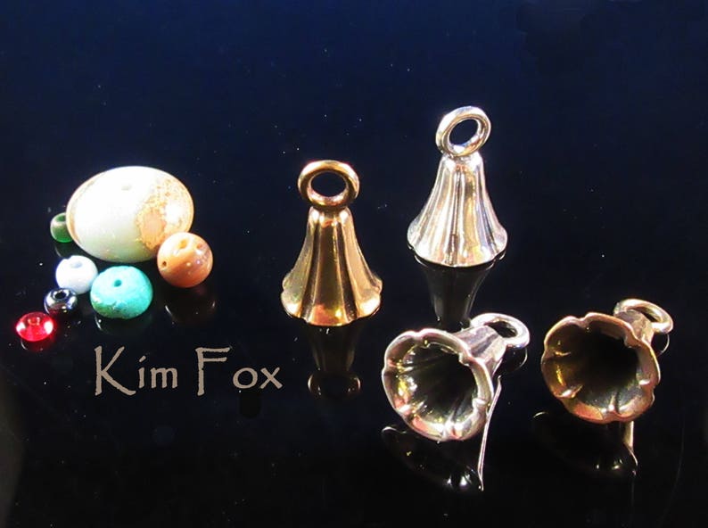 KF343RB A Pair of Bell Shaped Glue In Cones with large loop iin RED BRONZE designed by Kim Fox