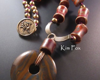 Winged or V Centerpiece Bail for a necklace in golden bronze designed by Kim Fox
