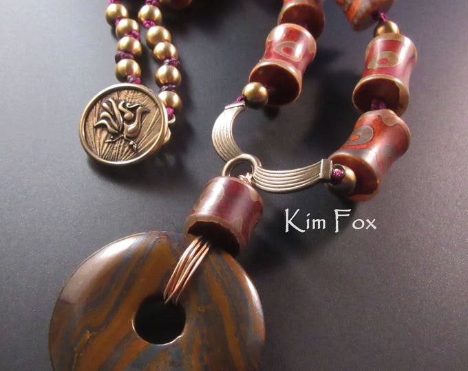 Winged or V Centerpiece Bail for a necklace in golden bronze designed by Kim Fox