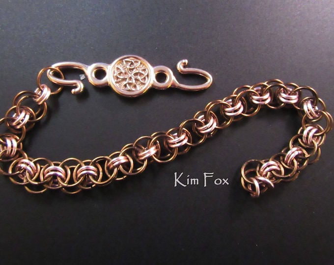 KF368 Rosette Hook for connecting cords, chain, chain mail. Two sided in bronze and sterling silver designed by Kim Fox