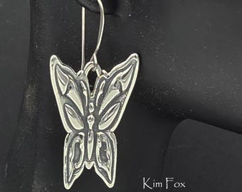 KFE602 Butterfly Earring Symbol of transformation, beauty and endurance