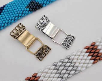 KF462 in silver and golden bronze designed by Kim Fox - a secure slide clasp suitable for a bracelet