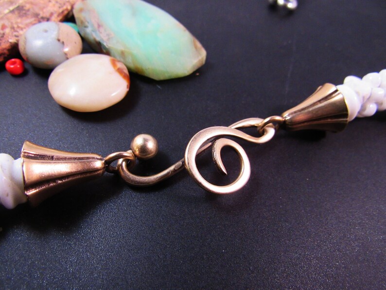 KF343RB A Pair of Bell Shaped Glue In Cones with large loop iin RED BRONZE designed by Kim Fox