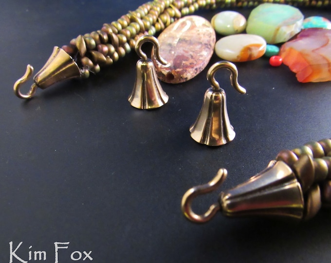 KF408 A Pair of Bell Shaped Glue In Cones with hooks in  Golden Bronze designed by Kim Fox