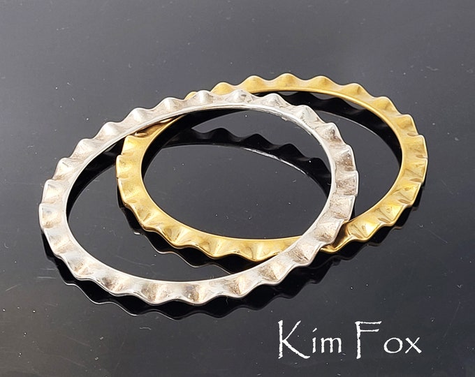 KFB27 7 inch Oval Two Sided Wave and Dot Bangle in Golden Bronze by Kim Fox made for the petite hand