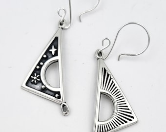 KFE492 Sun, Moon Star Reversable Earrings in silver and bronze designed by Kim Fox