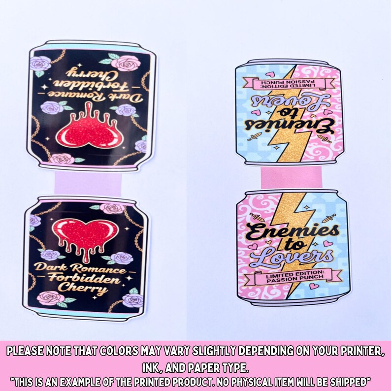 May include: Four decorative can-shaped stickers. Two feature a black background with a red heart and the text "Dark Romance - Forbidden Cherry." The other two have a light blue background with a gold lightning bolt and the text "Enemies to Lovers."