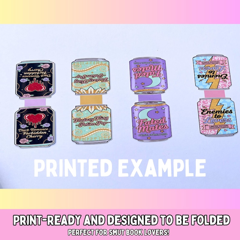 May include: Print-ready paper cutouts of fantasy-themed soda cans. Each can features unique designs and text, including "Dark Romance Forbidden Cherry," "Fantasy Fling Potion Pop," "Fated Mates," and "Enemies to Lovers." The text "PRINTED EXAMPLE" is also visible.