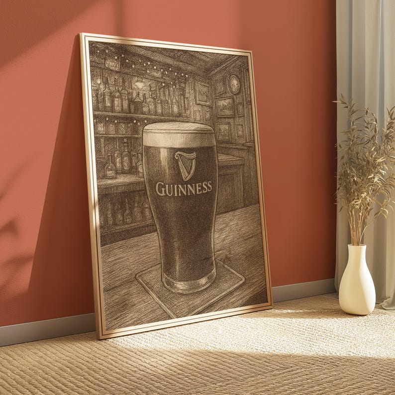 May include: A framed sepia-toned print of a pint of Guinness stout in a pub setting. The glass is centered on a wooden bar, with the Guinness logo visible. The background shows shelves of bottles and a clock.