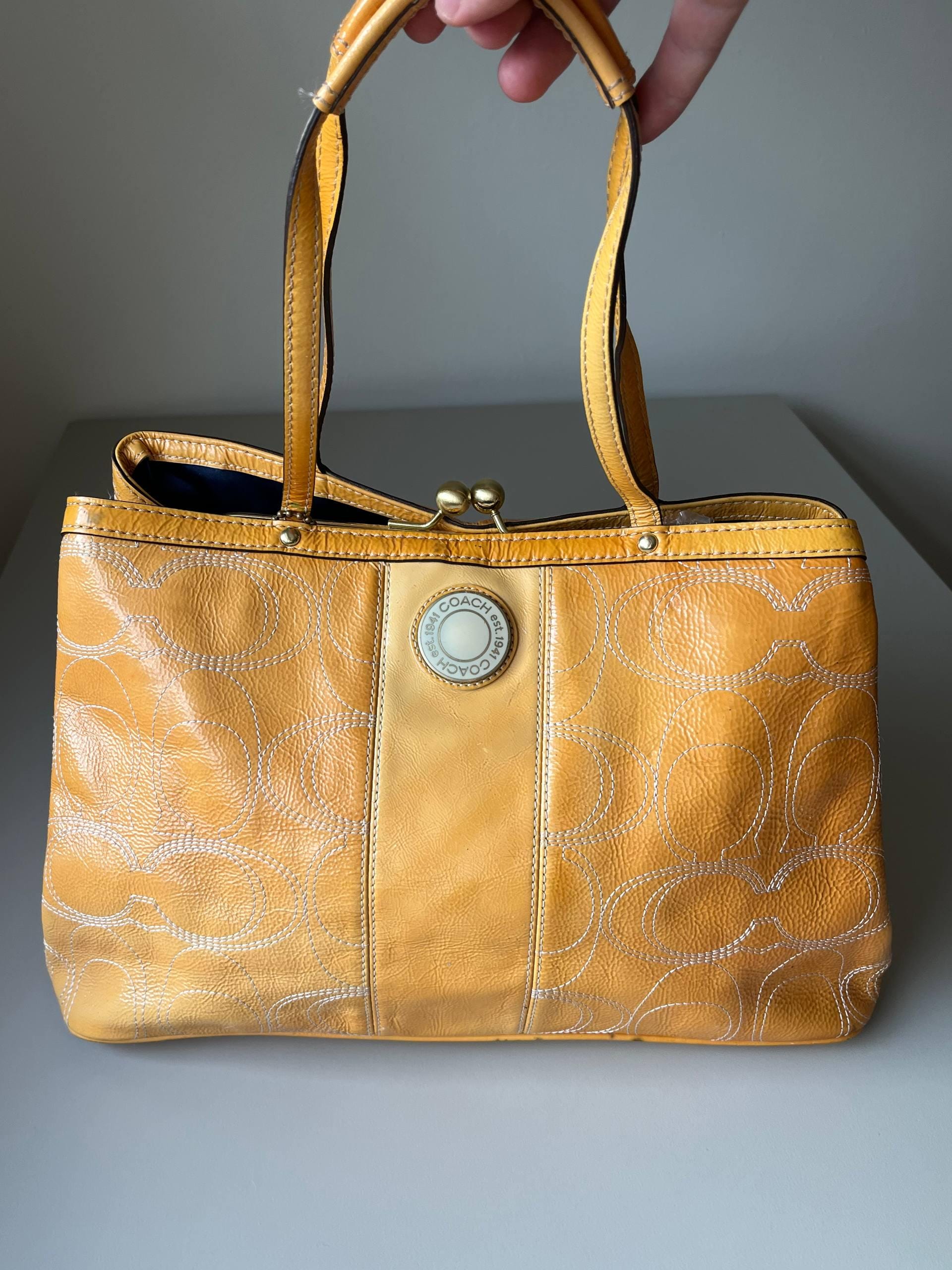 Coach Yellow Stitch Signature Patent Leather Frame Kiss Lock
