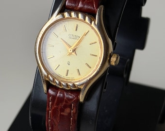 Citizen Womens Gold Tone Quartz Dress Watch Vintage Y2K Classic Leather Strap Elegant Minimalist Timepiece Stylish Everyday Accessory