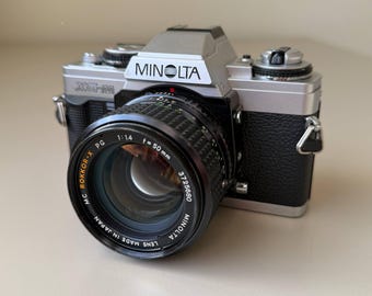 Minolta XG-M 35mm Film SLR Kit PG 50mm F1.4 135mm Telephoto Lens Set Vintage Photography Collectible Manual Focus