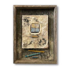 May include: A rectangular wall art piece in a weathered wooden frame featuring a textured, off-white central panel with dark speckles. It includes a small four-pane square grid, a horizontal yellow bar, and two blue and yellow bars layered over black netting.