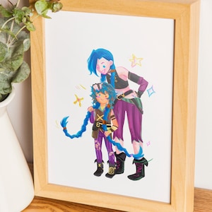 May include: A framed print depicting two cartoon characters with blue hair and purple clothing. The characters are standing together, with one appearing to support the other. The artwork is presented in a wooden frame.