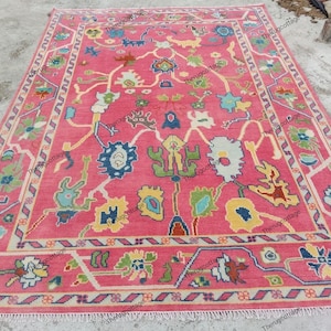 Vibrant Pink Oushak Rug – Hand-Knotted Turkish Wool Masterpiece with Tribal Floral Motifs