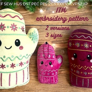 May include: Three embroidered mitten-shaped plush toys in cream, pink, and burgundy, each with a smiling face and decorative stitching. The text "ITH embroidery pattern" is visible, along with size options.