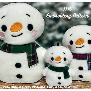 May include: Three plush snowmen of varying sizes, each with a white body, black eyes, an orange carrot nose, and a smiling mouth. They wear plaid scarves in green and red. The image includes the text "ITH Embroidery Pattern" and size details.