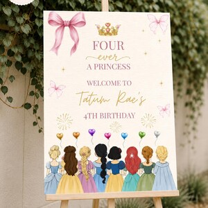 May include: A rectangular birthday welcome sign featuring a pink bow, a gold crown, and the text "FOUR ever A PRINCESS WELCOME TO Tatum Rae's 4TH BIRTHDAY". Below the text are illustrations of eight princesses with balloons and fireworks.