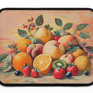 May include: Laptop sleeve featuring a still life of various fruits. The design includes oranges, peaches, strawberries, blueberries, and a kiwi. The artwork has a vintage style with a soft color palette and a black border.