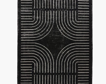 Alfombra de lana neozelandesa anudada a mano, moderna, geométrica, en blanco y negro.