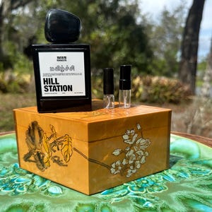 May include: A rustic wooden sign with the text "Welcome to our home" in a handwritten style. The sign features a distressed finish and a simple, inviting design, perfect for a front porch or entryway.