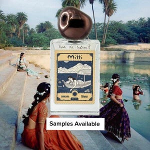May include: A perfume bottle with a brown cap and a label featuring a black and white illustration of a boat scene. The bottle is labeled "Mitti" and "Shikara". The image also includes women in traditional clothing near a body of water. Text on the image reads "Samples Available".