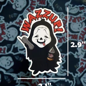 May include: A sticker featuring a cartoon Ghostface character with the text "WAZZUP!" in red. The sticker is 2.9 inches tall and 2.1 inches wide. The character is holding a phone and a bottle labeled "Kille".