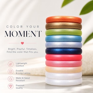 May include: A vertical stack of ten smooth, rounded rings in various colors including orange, bronze, green, blue, lavender, dark blue, red, pink, cream, and white. Text reads: COLOR YOUR MOMENT, Bright. Playful. Timeless. Find the color that fits you.