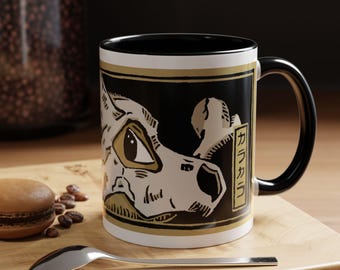 Cubone inspired Artistic Black-Handled Coffee Mug, Unique Gift for Art Lovers, Home Décor, Graphic Novelty Mug, Stylish Kitchenware Cubone