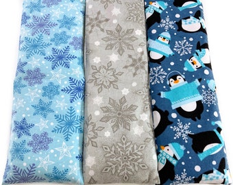 Flax Seed Rice Heated neck wrap penguins or snowflakes washable covers. Heat pack Microwave neck wrap Rice pillow care gift for teacher.