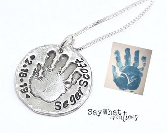 Your baby or child's ACTUAL hand prints made into silver pendants Includes one hand print charm with stamped name and birthday