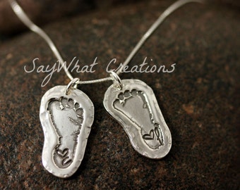 Your baby or child's ACTUAL footprints made into silver pendants Includes TWO footprint charms with stamped initial and heart