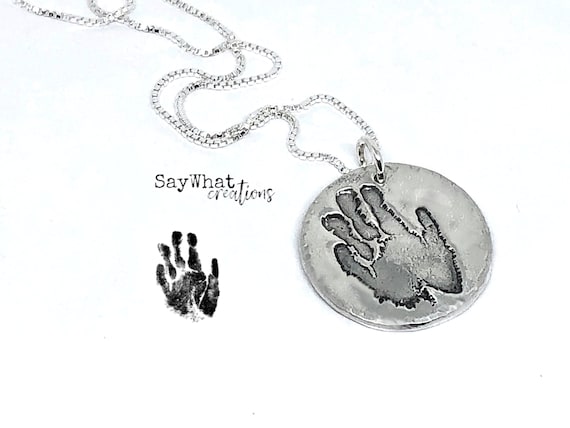 Your baby or child's ACTUAL hand prints made into silver pendants Includes  one hand print charm