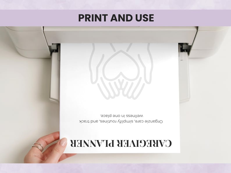 Printable caregiver planner pages being printed for binder organization and daily use
