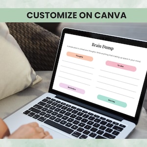 Editable ADHD planner Canva template shown on laptop for customizing worksheets and planners