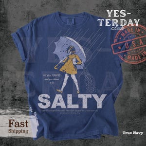 Salty Girl tee women vintage comfort colors shirt, Salty girl summer graphic tee outfit, Retro salty girl shirt women casual wear, Comfort Colors women vintage style t-shirt, Sassy salty girl graphic top summer, Trendy casual women summer tee, salty girl shirt, ladies summer tee, summer outfit women, vintage style tee, gift for her, retro tee, round neck tee, sassy graphic top, short sleeve tee, trendy casual tee, summer graphic tee, comfort colors women shirt.