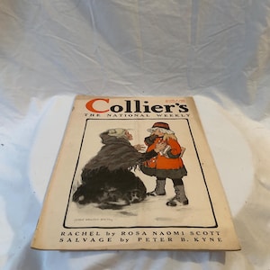 May include: A vintage Collier's The National Weekly magazine dated June 8, 1918. The cover features an illustration by Jessie Willcox Smith of an older person in a dark shawl and a child in a red coat. Text includes RACHEL by ROSA NAOMI SCOTT and SALVAGE by PETER B. KYNE.