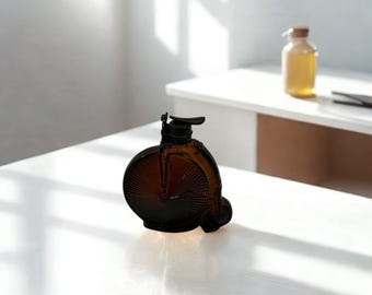 Decantador vintage de loción para después del afeitado Avon Columbia High Wheeler • Botella de vidrio ámbar con forma de bicicleta • Artículo de colección de los años 60-70