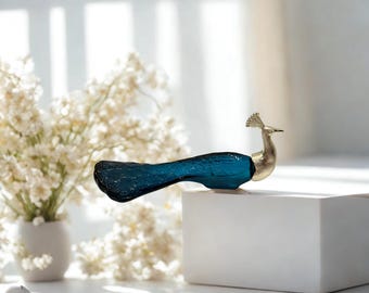 Vintage Avon Peacock Perfume Bottle – Blue Glass with Silver Plastic Head, 1970s Collectible
