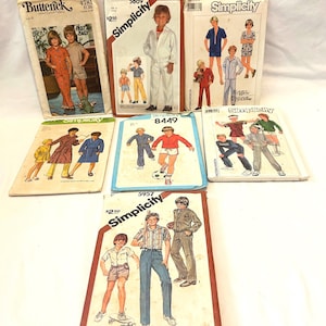 May include: A collection of vintage sewing patterns for boys' clothing, sizes 6-12. The patterns feature illustrations of various outfits, including pajamas, tracksuits, and casual wear. Brands include Butterick and Simplicity.