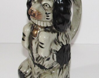 CAST IRON DOORSTOP MECHANICAL BANK SPANIEL DOG STATUE