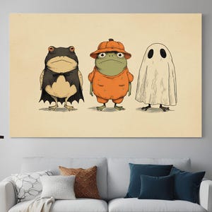 Halloween Frogs Framed Print - spooky cute Toad and Frog in pumpkin ghost and bat costumes wall art