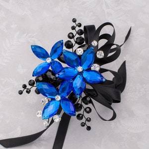 Royal blue and black corsage by Ky Kampfeld for prom, weddings, homecoming, and dances